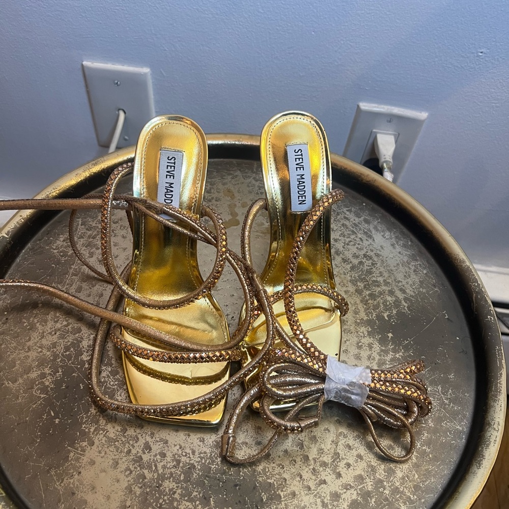 Brand new Steve Madden gold wrap around heels